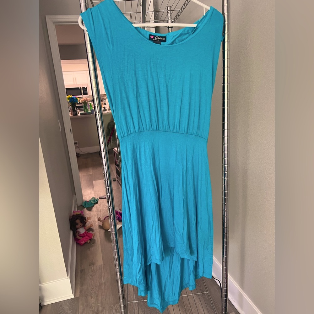 Rayon/spandex turquoise dress with cut out in back
